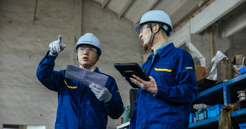 two field service workers talking about inventory